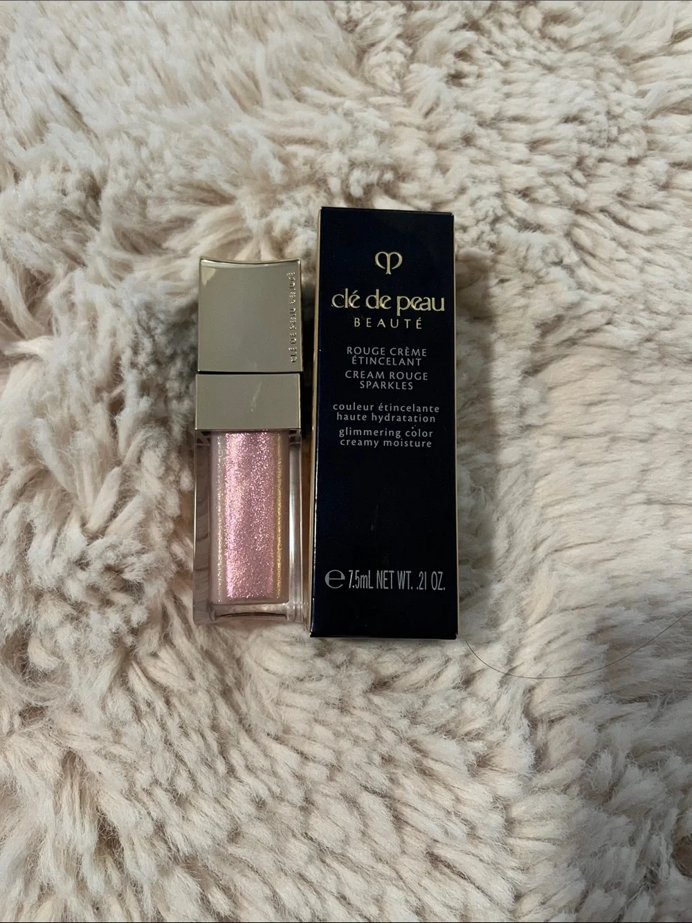 Cle De Peau Cream Rouge Sparkles in 303 Medinilla Magnifica